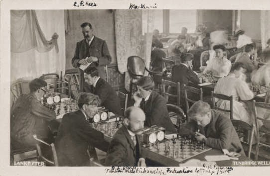 L.P.Rees (standing) at the Tunbridge Wells BCF Championship 1908, and J.H. Blake is seated.